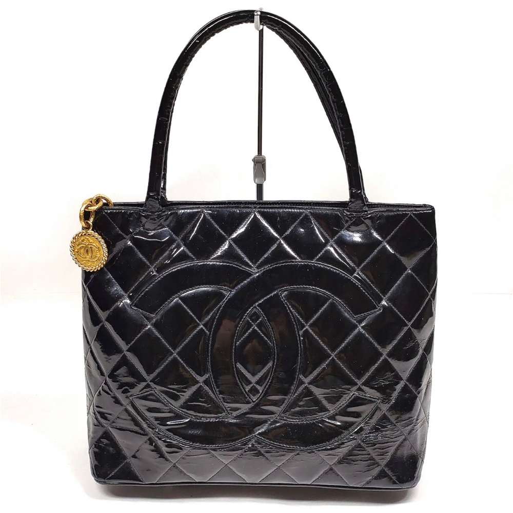 Authentic Chanel Medallion Black Enamel